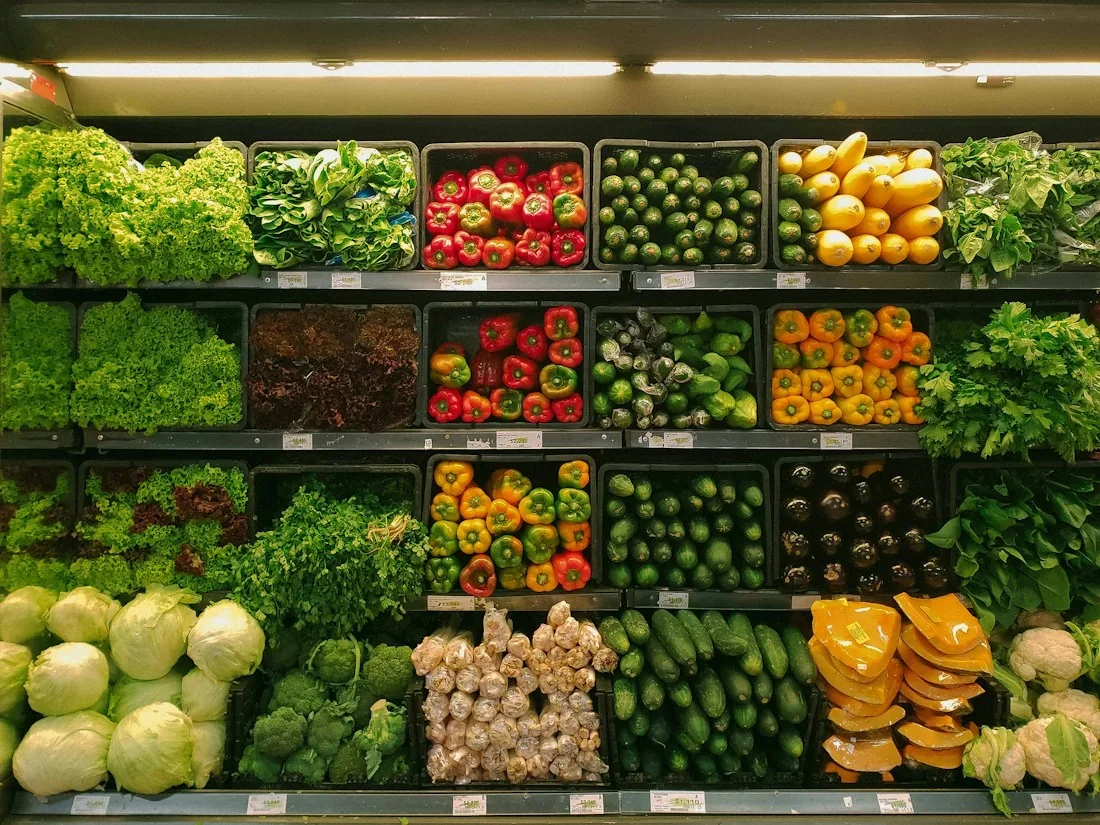 An abundant selection of colourful fresh vegetables at a produce market